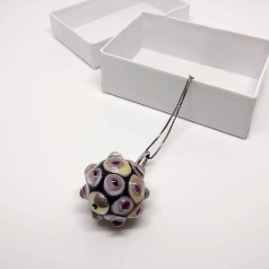 Necklace with a pendant made with a bubbly effect, with a delicate fusion of colors including pristine white, vibrant yellow, captivating cyclamen purple, and soft powder pink. Chain in silver color.